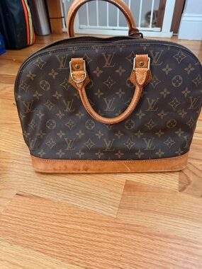 Louis Vuitton Brown Interior with Tan Trim and Yellow Stitching